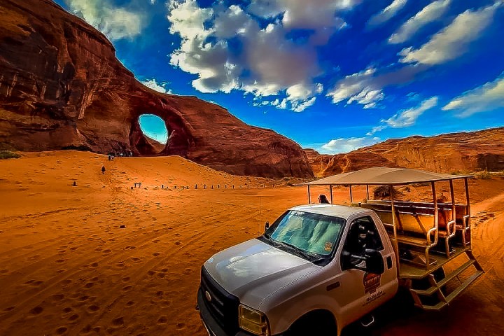 a vehicle open air jeep parked on the side of a arch in MV