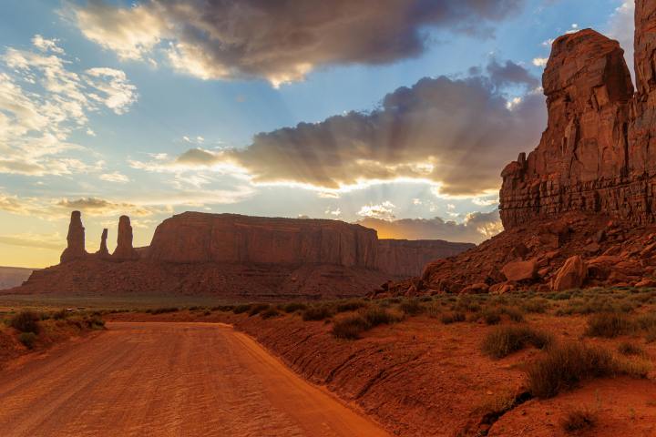 Three sisters and camel butte at sunset